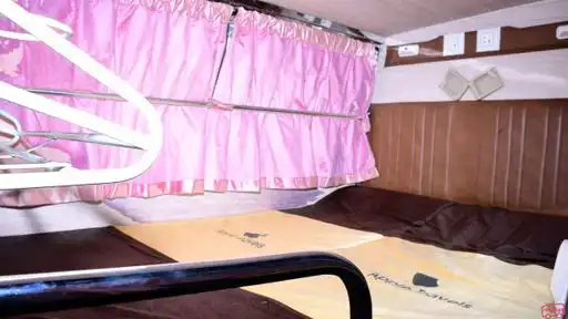 Apple Travels Bus-Front Image