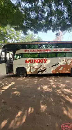 Sunny Travels Bus-Side Image