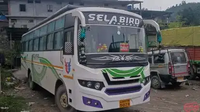 Sela Bird Travels Bus-Side Image