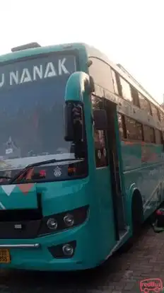 Guru Nanak Travels Bus-Side Image