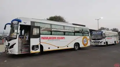 Mahalakshmi Holidays Bus-Side Image