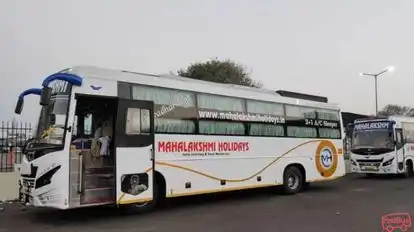 Mahalakshmi Holidays Bus-Side Image