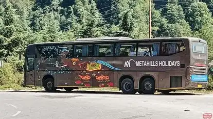 Metahills holidays Bus-Side Image