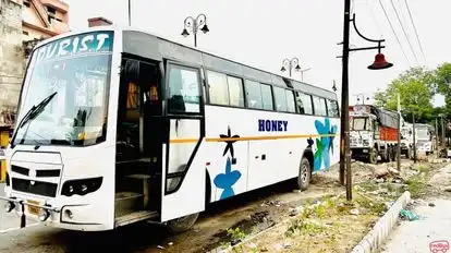 HONEY TRAVELS Bus-Side Image