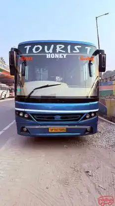 HONEY TRAVELS  Bus-Front Image