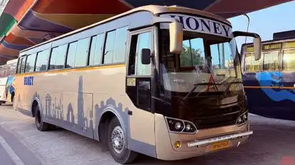 HONEY TRAVELS  Bus-Front Image