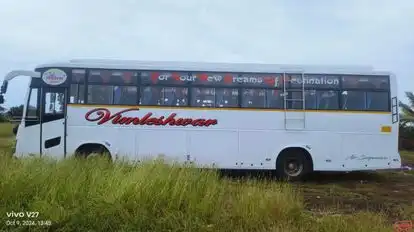 Tanishq Enterprises Bus-Side Image
