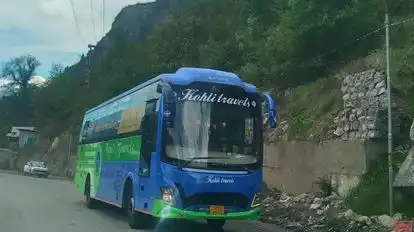 Kohli Tour & Travellers Bus-Front Image