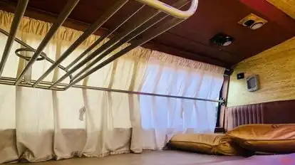 Naina Tranz Bus-Side Image