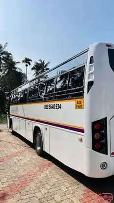 Achayans Holidays Bus-Side Image
