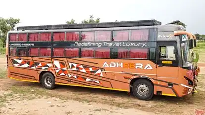 Adheera tours and travels Bus-Side Image