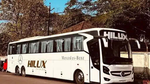 Hilux Travels Bus-Front Image
