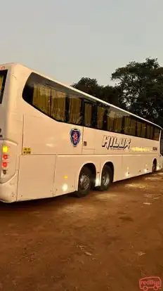Hilux Travels Bus-Side Image