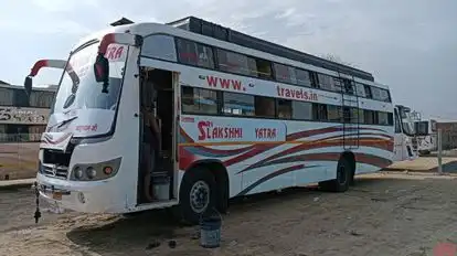 Sri Lakshmi Yatra Travels and Cargo Bus-Side Image