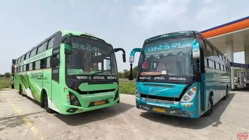 DWARKESH EXPRESS TRAVELS Bus-Front Image
