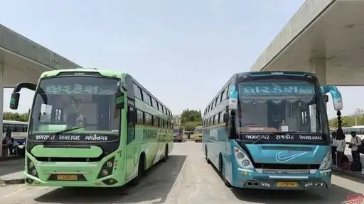 DWARKESH EXPRESS TRAVELS Bus-Front Image