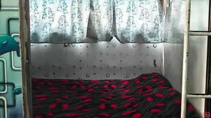 DWARKESH EXPRESS TRAVELS Bus-Front Image