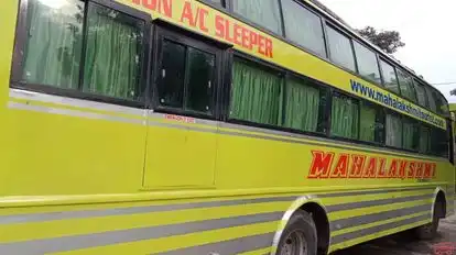Mahalakshmi Tourist Bus-Side Image