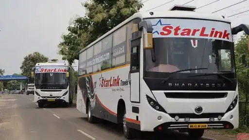 Starlink Tours And Travels Bus-Front Image