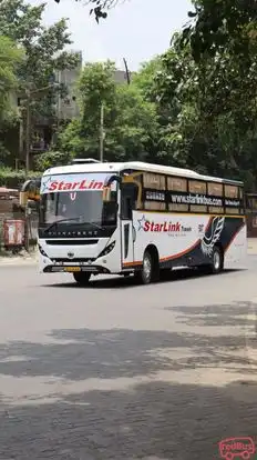 Starlink Tours And Travels Bus-Side Image