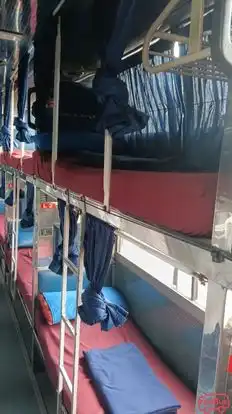 OOM GARUDA TOURS AND TRAVELS Bus-Side Image