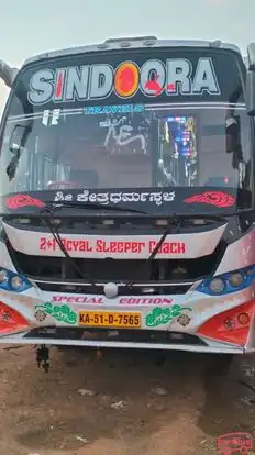 SINDOORA TRAVELS Bus-Front Image