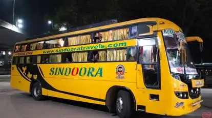 SINDOORA TRAVELS Bus-Side Image