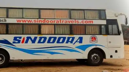 SINDOORA TRAVELS Bus-Side Image