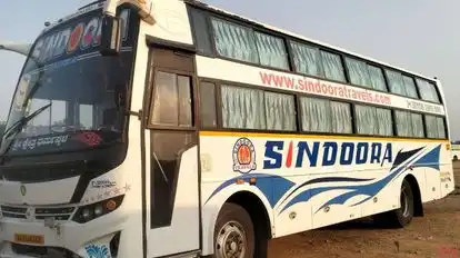 SINDOORA TRAVELS Bus-Side Image