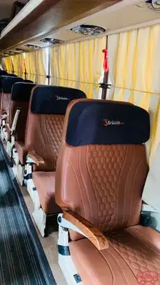 Tiger Travels & Cargo Bus-Front Image