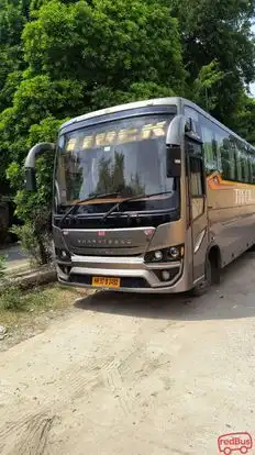 Tiger Travels & Cargo Bus-Side Image