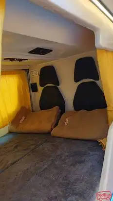 GUJARAT TRAVELS Bus-Side Image
