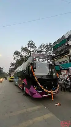 SHREEJEE TRAVELS Bus-Side Image