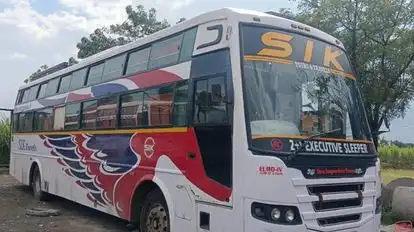SIK TOURS AND TRAVELS Bus-Side Image