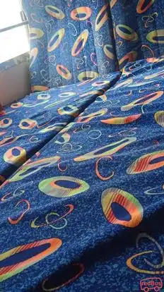 SIK TOURS AND TRAVELS Bus-Seats Image