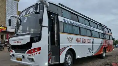 AM TOURS AND TRAVELS Bus-Front Image
