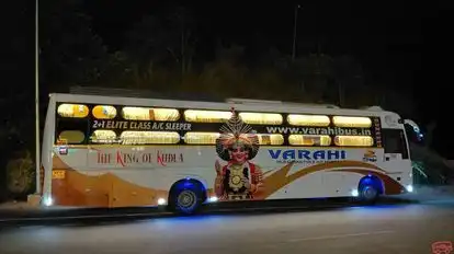 VARAHI TRAVELS Bus-Side Image