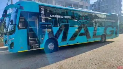 MALGI TRAVELS Bus-Side Image