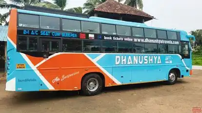 DHANUSHYA TRAVELS  Bus-Side Image