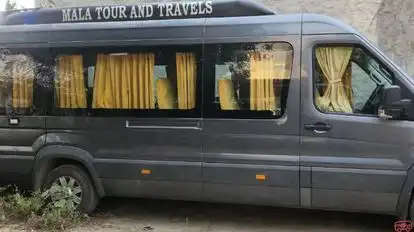KAMYA TRAVELS PVT LTD Bus-Side Image