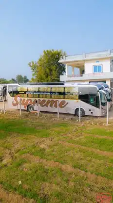 SUPREME TRAVELS Bus-Side Image