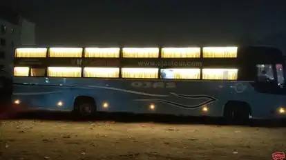 OJAS TOUR AND TRAVEL Bus-Side Image
