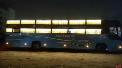 OJAS TOUR AND TRAVEL Bus-Side Image