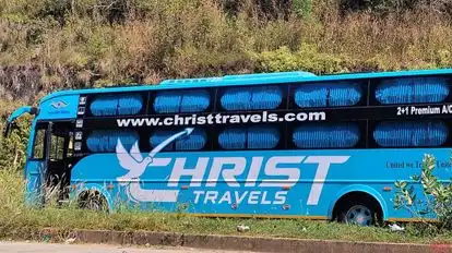 CHRIST TRAVELS Bus-Side Image