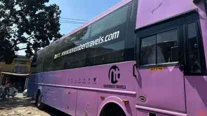 November Travels Bus-Side Image