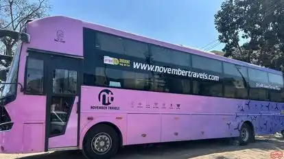 November Travels Bus-Side Image