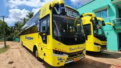 VINESH TRANSPORTS Bus-Side Image