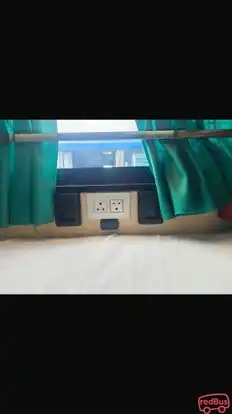 M L Sharma Travels Bus-Front Image