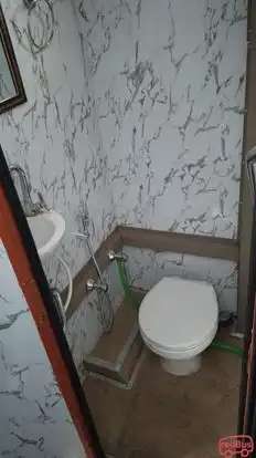 Sanju Holidays ( India) Bus-Side Image