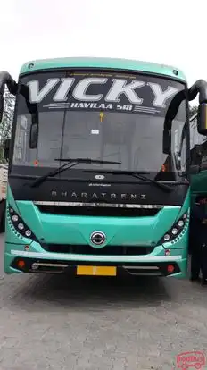 VICKY TRAVELS Bus-Front Image
